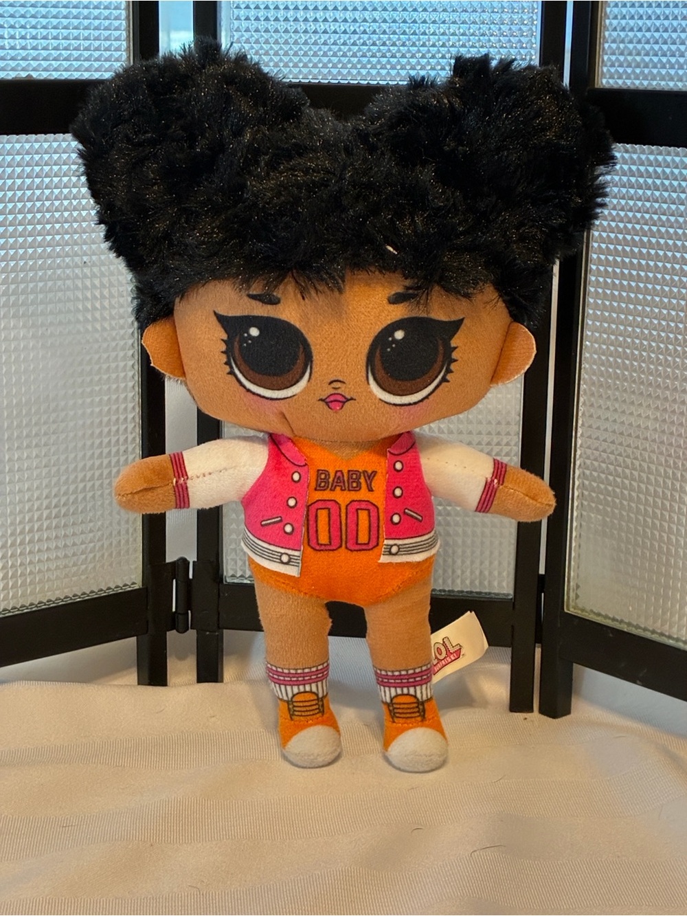 L.O.L. Surprise! Baby 00 Plush Doll - Black Hair, Orange & Pink Outfit, 9”